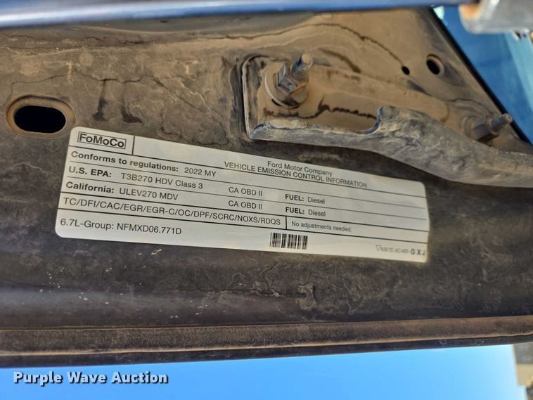 image for item EV5917 2022 Ford F350 Crew Cab flatbed pickup truck
