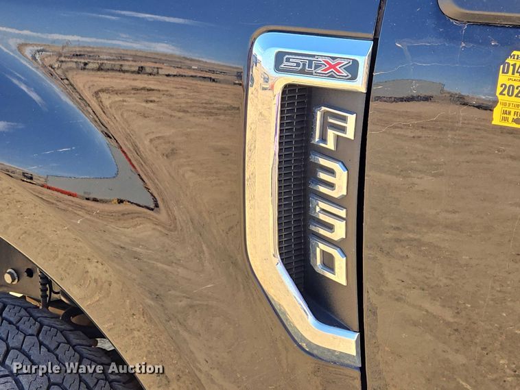 image for item EV5917 2022 Ford F350 Crew Cab flatbed pickup truck