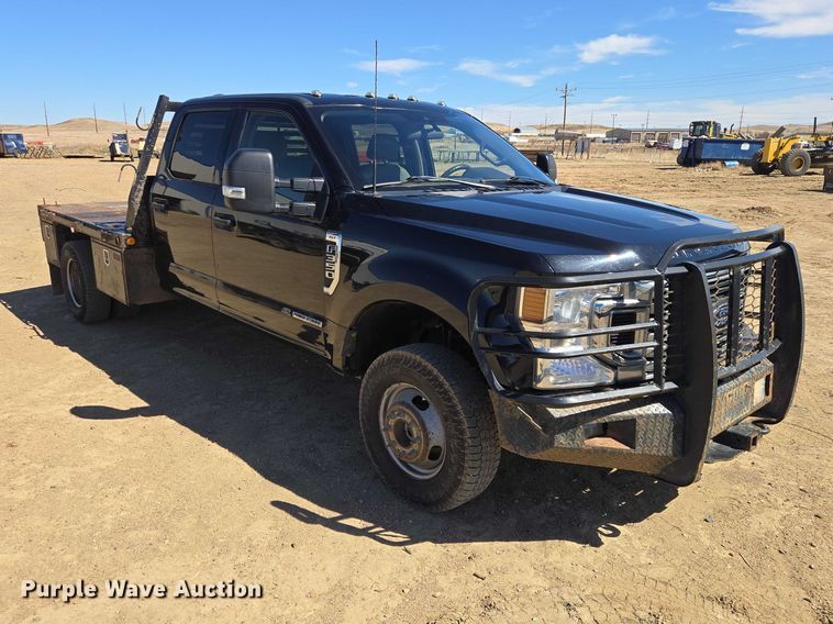 image for item EV5920 2022 Ford F350 Crew Cab flatbed pickup truck