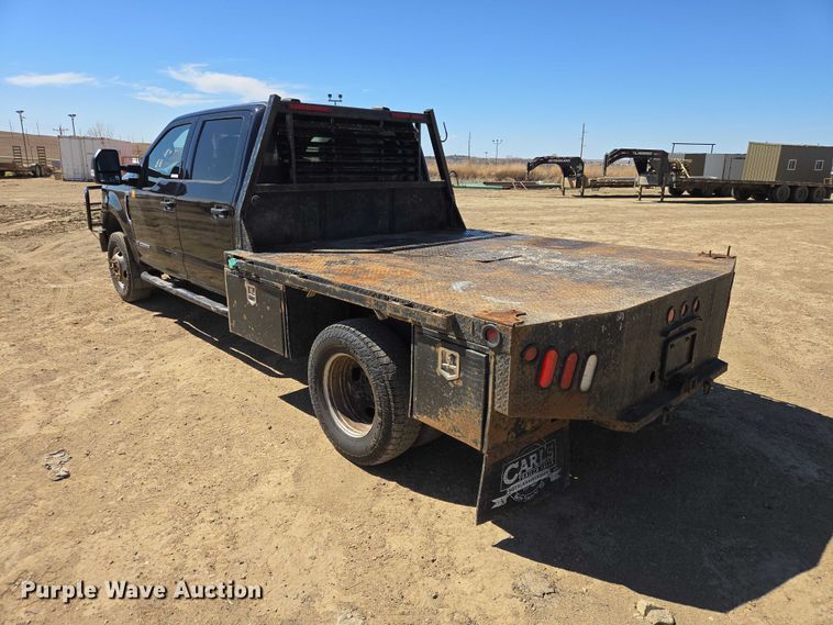 image for item EV5920 2022 Ford F350 Crew Cab flatbed pickup truck