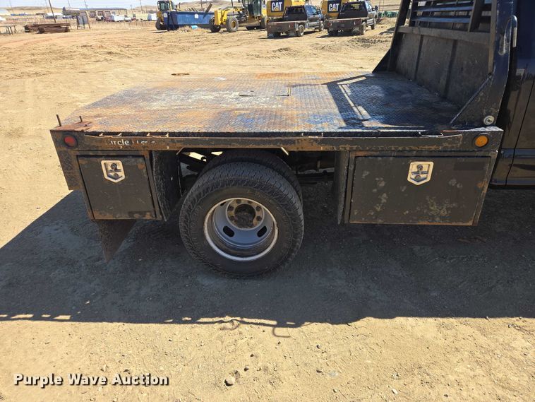 image for item EV5920 2022 Ford F350 Crew Cab flatbed pickup truck
