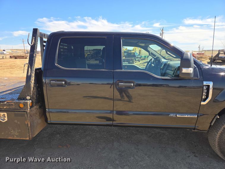 image for item EV5920 2022 Ford F350 Crew Cab flatbed pickup truck