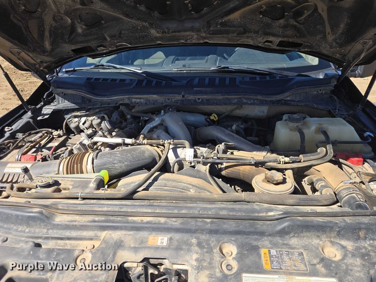 image for item EV5920 2022 Ford F350 Crew Cab flatbed pickup truck