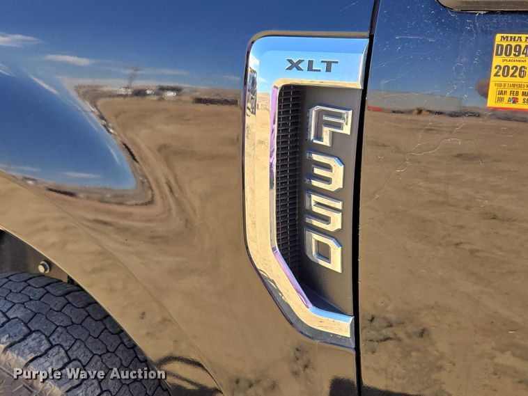 image for item EV5920 2022 Ford F350 Crew Cab flatbed pickup truck