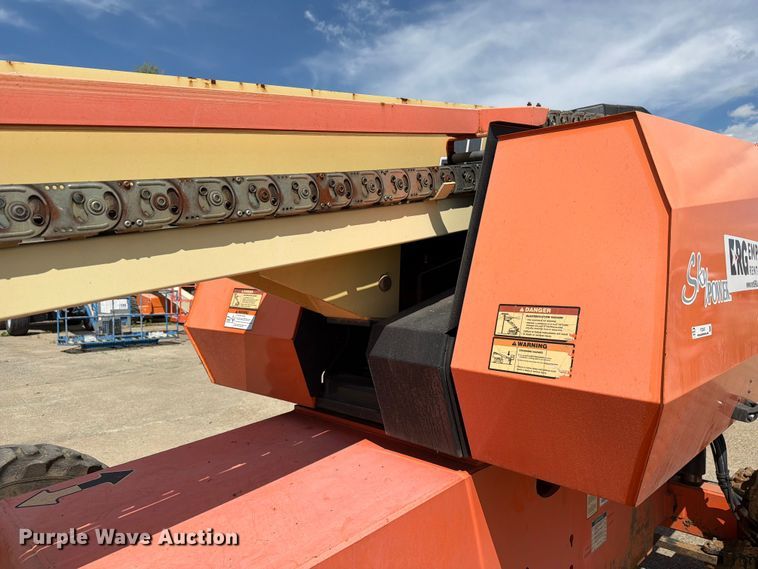 image for item FC3047 2015 JLG 660SJ boom lift