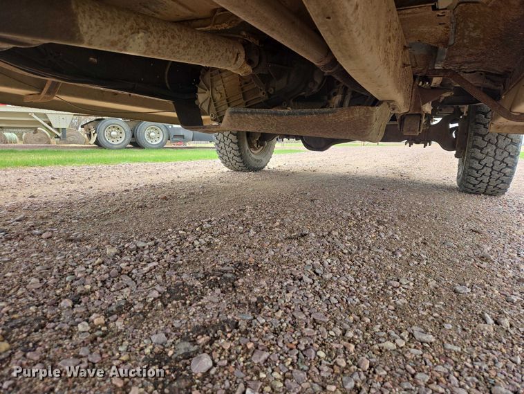 image for item EV5973 1989 Ford F250 flatbed pickup truck