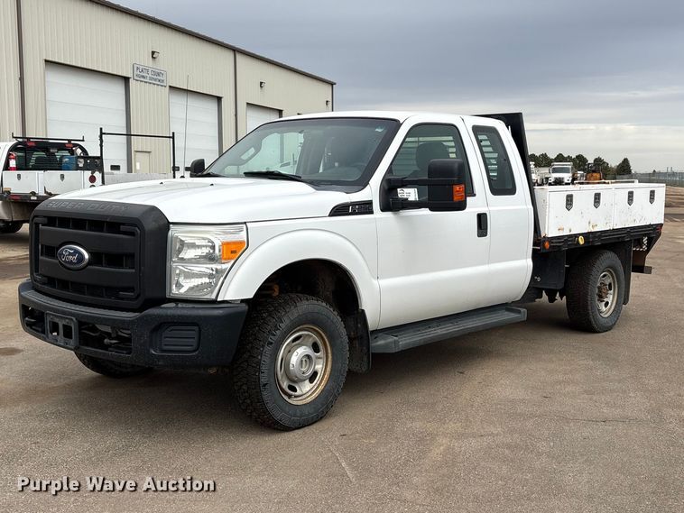 2011 Ford F250 Super Duty Ext. Cab flatbed pickup truck