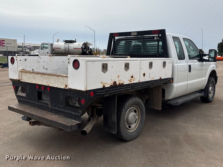 image for item FG2948 2011 Ford F250 Super Duty Ext. Cab flatbed pickup truck