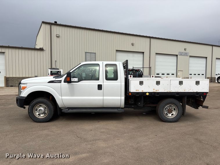 image for item FG2948 2011 Ford F250 Super Duty Ext. Cab flatbed pickup truck
