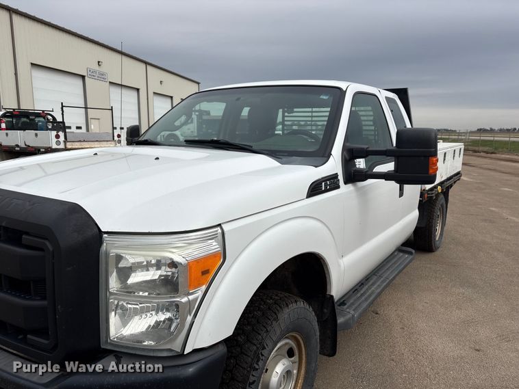 image for item FG2948 2011 Ford F250 Super Duty Ext. Cab flatbed pickup truck
