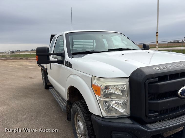 image for item FG2948 2011 Ford F250 Super Duty Ext. Cab flatbed pickup truck