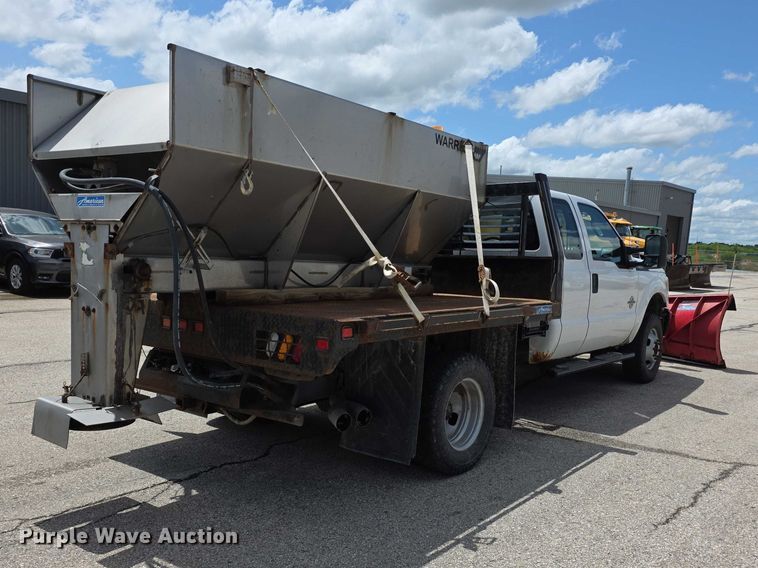 image for item FH6052 2014 Ford F350 Super Duty Ext. Cab dump flatbed pickup truck