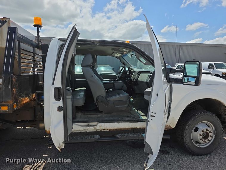 image for item FH6052 2014 Ford F350 Super Duty Ext. Cab dump flatbed pickup truck