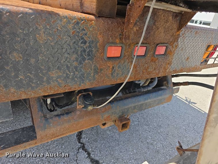image for item FH6052 2014 Ford F350 Super Duty Ext. Cab dump flatbed pickup truck