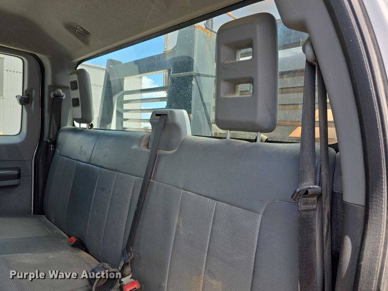 image for item FH6052 2014 Ford F350 Super Duty Ext. Cab dump flatbed pickup truck