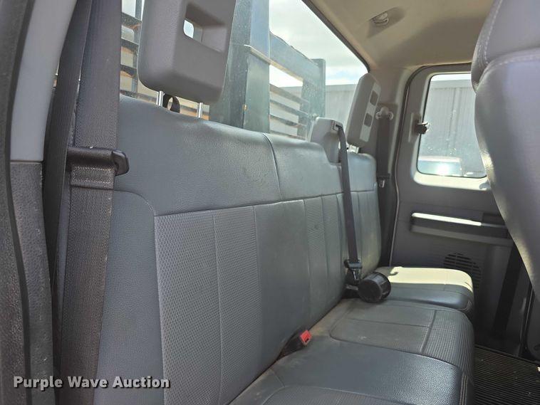 image for item FH6052 2014 Ford F350 Super Duty Ext. Cab dump flatbed pickup truck