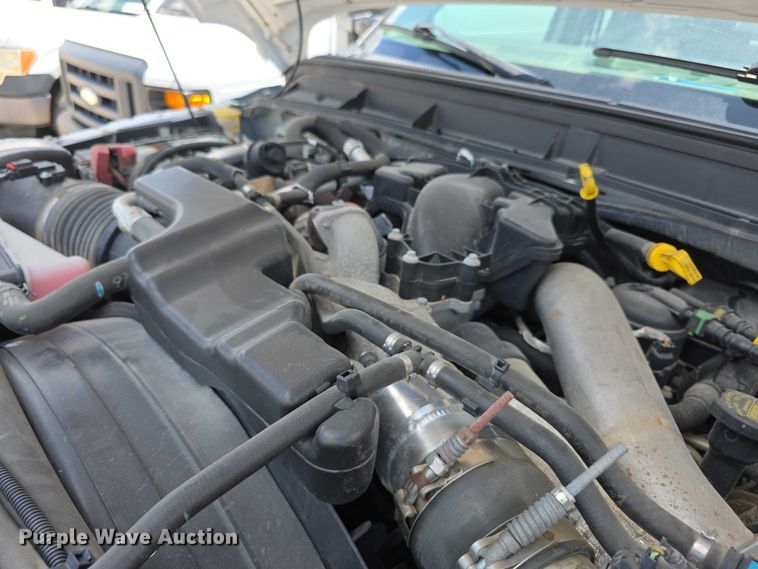 image for item FH6052 2014 Ford F350 Super Duty Ext. Cab dump flatbed pickup truck