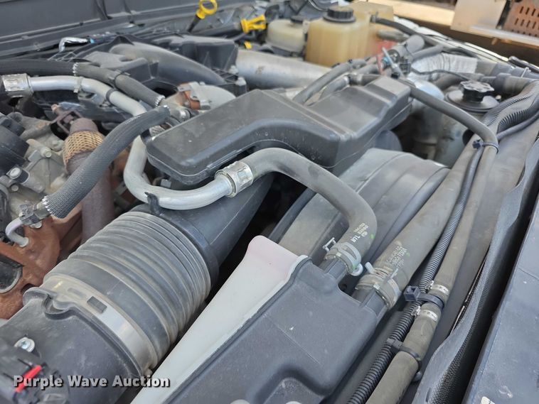 image for item FH6052 2014 Ford F350 Super Duty Ext. Cab dump flatbed pickup truck