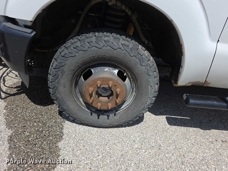 image for item FH6052 2014 Ford F350 Super Duty Ext. Cab dump flatbed pickup truck