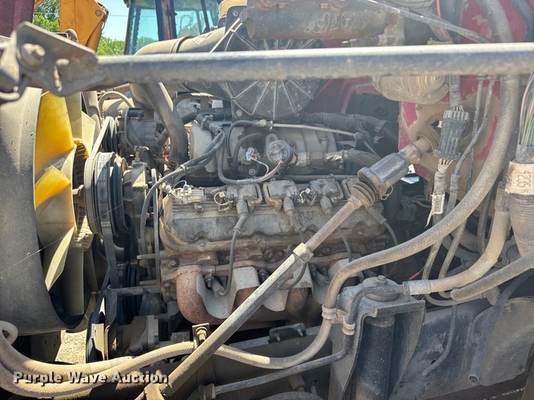 image for item FB7244 1999 Chevrolet C6500 flatbed truck