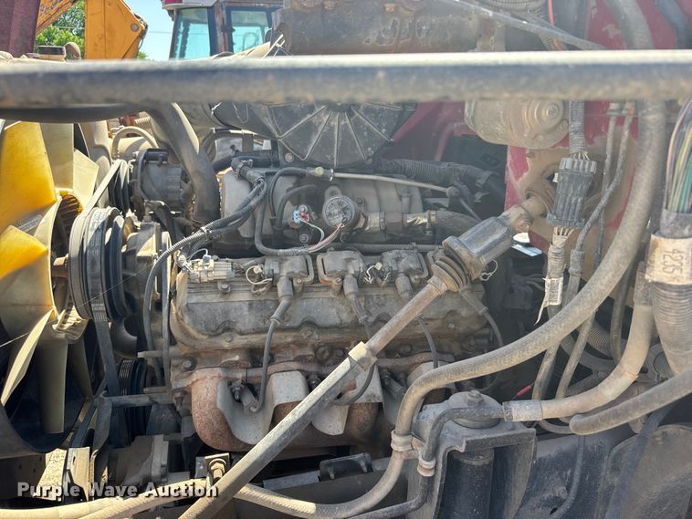 image for item FB7244 1999 Chevrolet C6500 flatbed truck