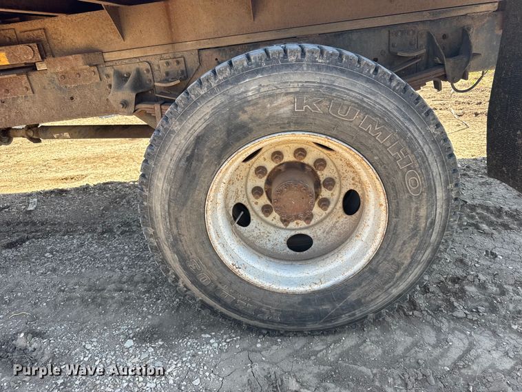 image for item FB7244 1999 Chevrolet C6500 flatbed truck