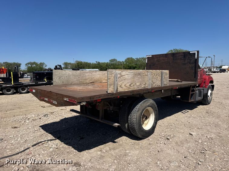 image for item FB7245 1997 GMC C6500 flatbed truck