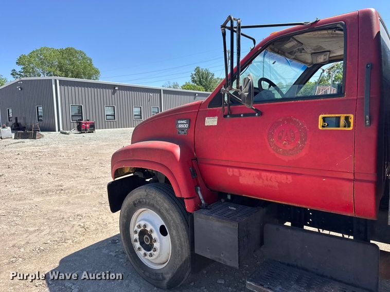 image for item FB7245 1997 GMC C6500 flatbed truck