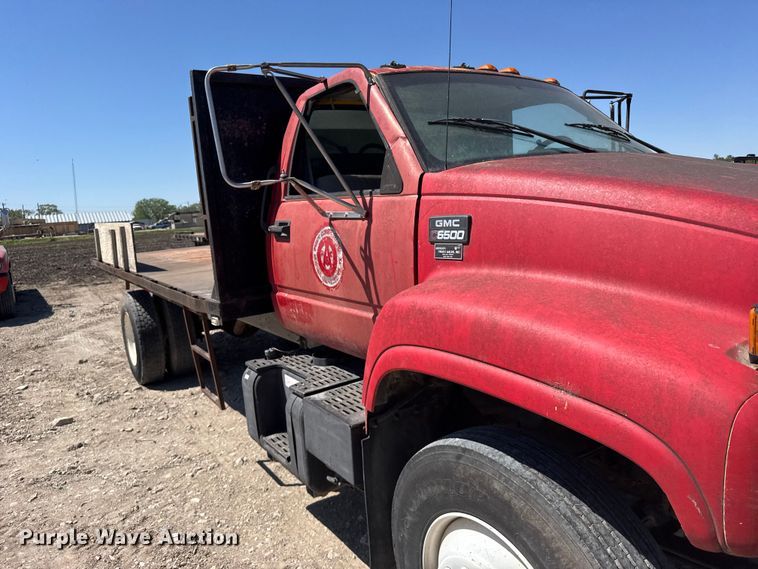 image for item FB7245 1997 GMC C6500 flatbed truck