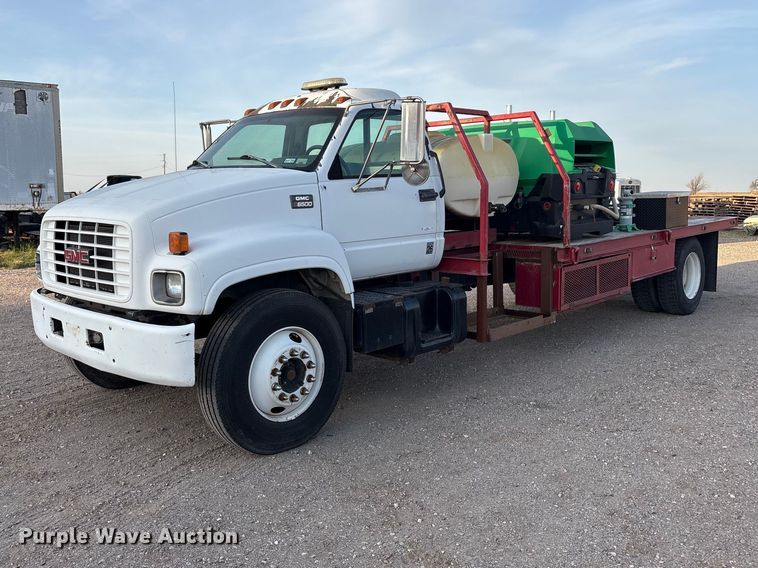 image for item FC2156 1999 GMC C7 flatbed truck