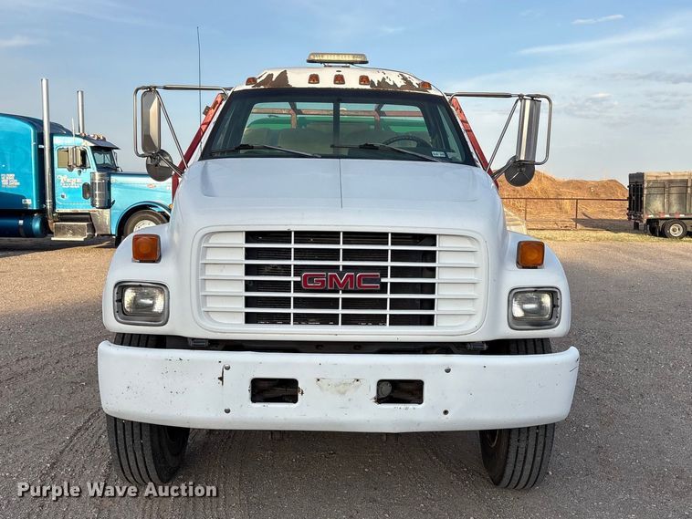 image for item FC2156 1999 GMC C7 flatbed truck