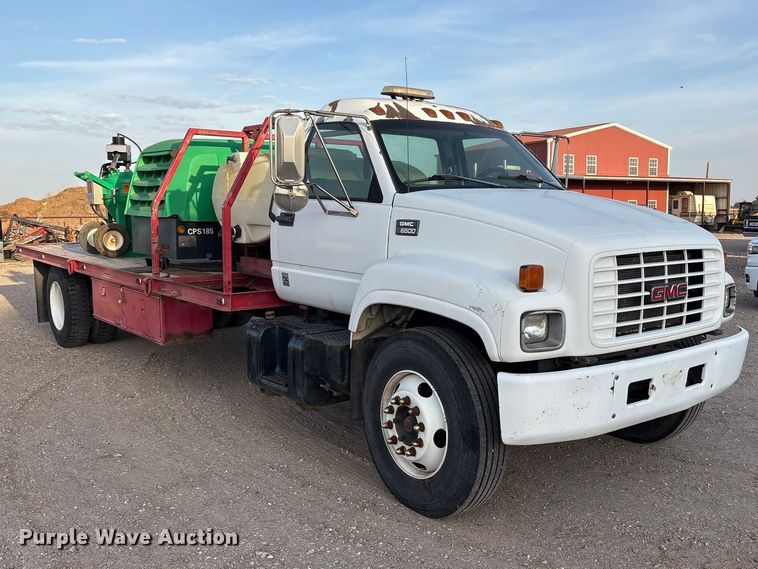 image for item FC2156 1999 GMC C7 flatbed truck