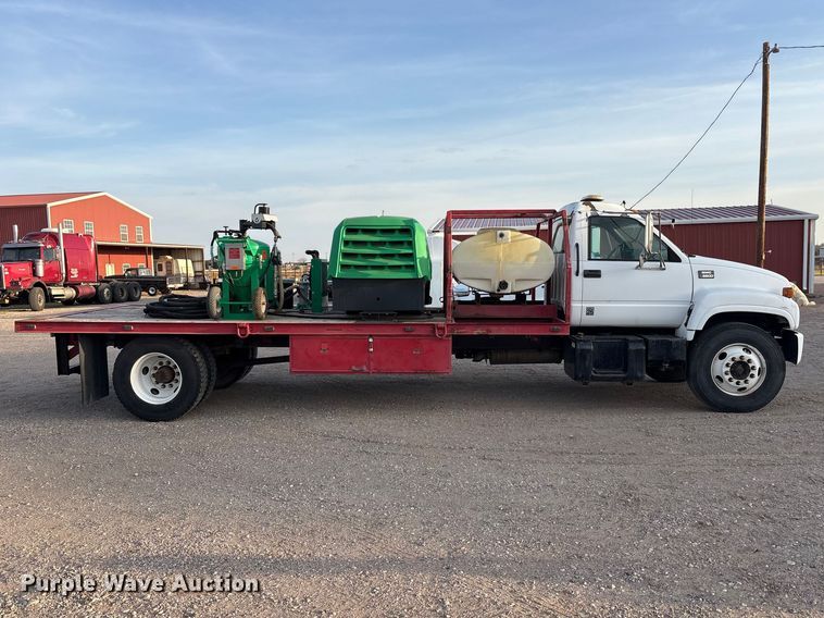 image for item FC2156 1999 GMC C7 flatbed truck