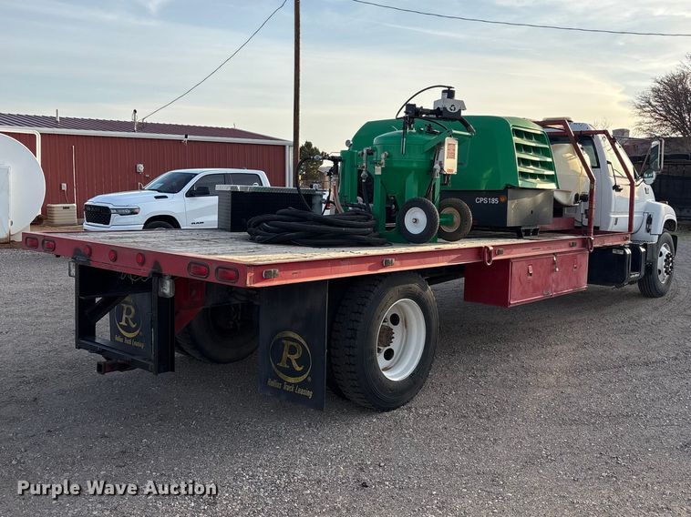image for item FC2156 1999 GMC C7 flatbed truck