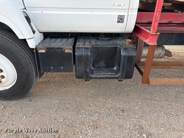 image for item FC2156 1999 GMC C7 flatbed truck