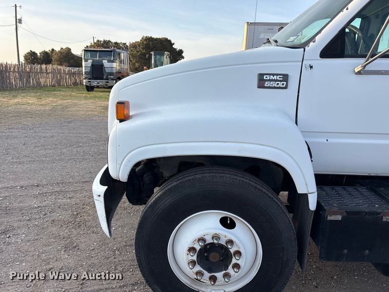 image for item FC2156 1999 GMC C7 flatbed truck