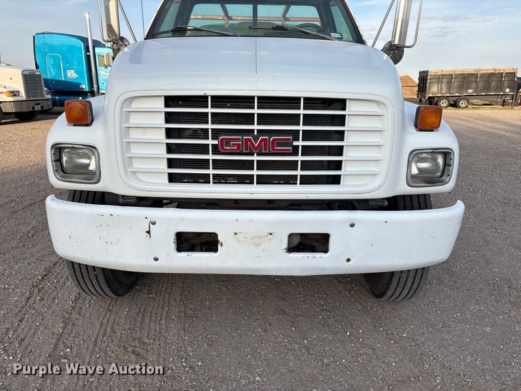image for item FC2156 1999 GMC C7 flatbed truck
