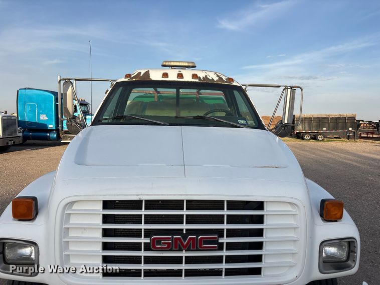 image for item FC2156 1999 GMC C7 flatbed truck