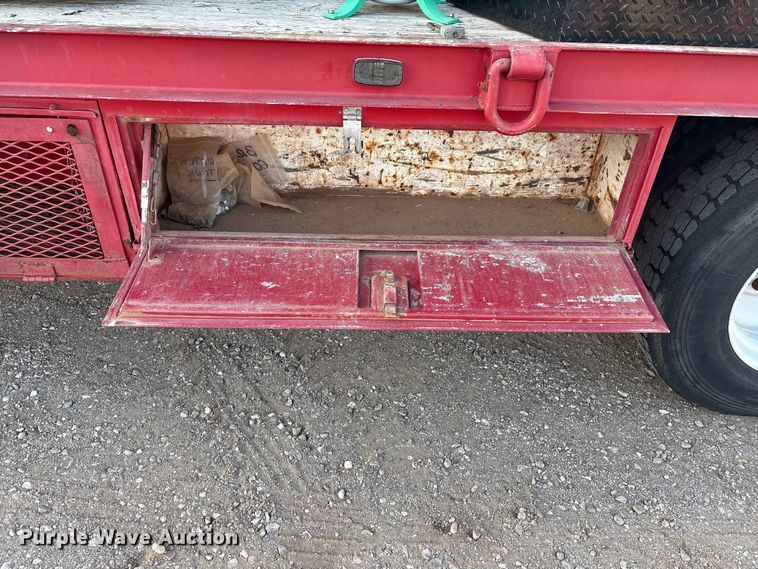 image for item FC2156 1999 GMC C7 flatbed truck