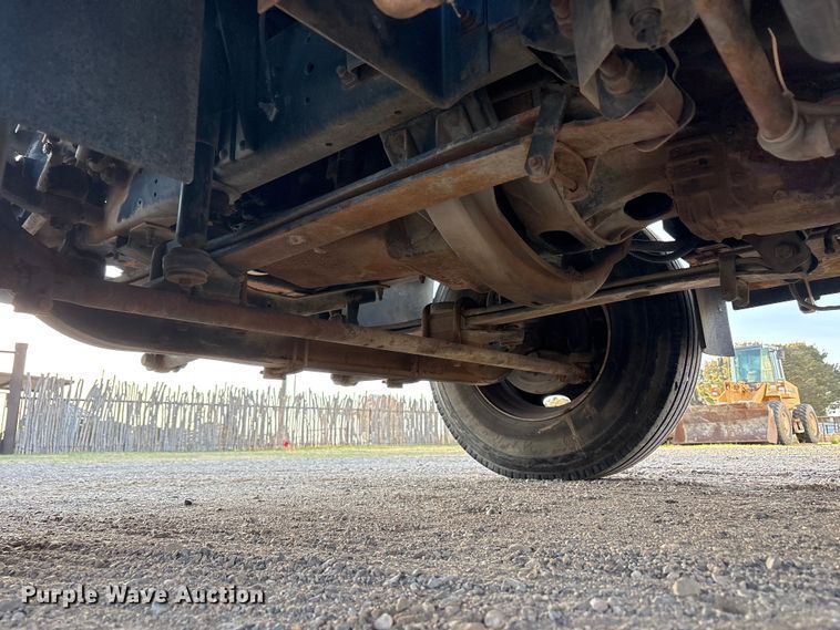 image for item FC2156 1999 GMC C7 flatbed truck