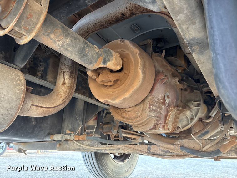 image for item FC2156 1999 GMC C7 flatbed truck