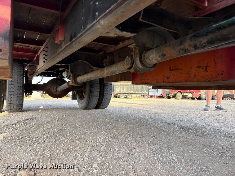 image for item FC2156 1999 GMC C7 flatbed truck