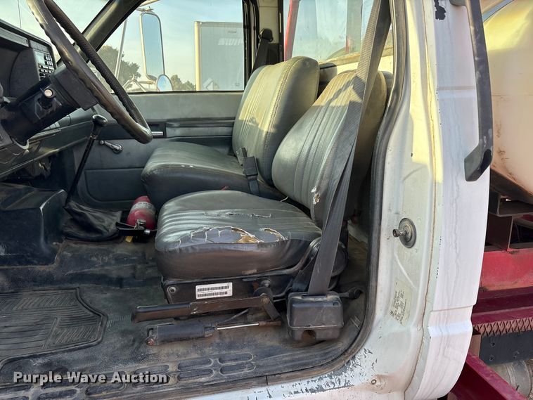 image for item FC2156 1999 GMC C7 flatbed truck