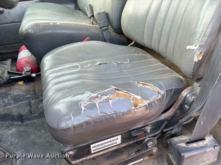 image for item FC2156 1999 GMC C7 flatbed truck