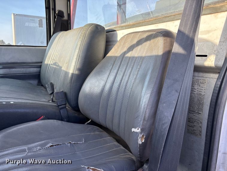 image for item FC2156 1999 GMC C7 flatbed truck