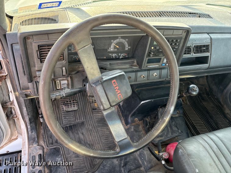 image for item FC2156 1999 GMC C7 flatbed truck