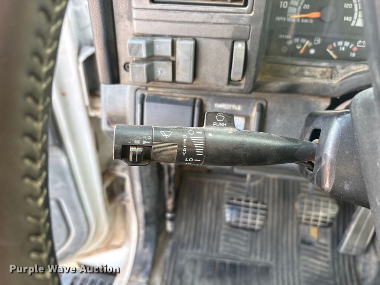 image for item FC2156 1999 GMC C7 flatbed truck