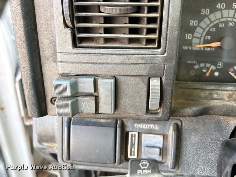 image for item FC2156 1999 GMC C7 flatbed truck