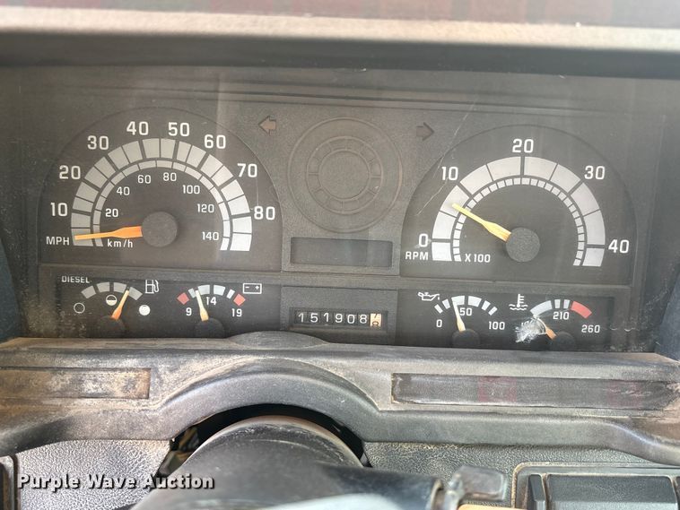image for item FC2156 1999 GMC C7 flatbed truck