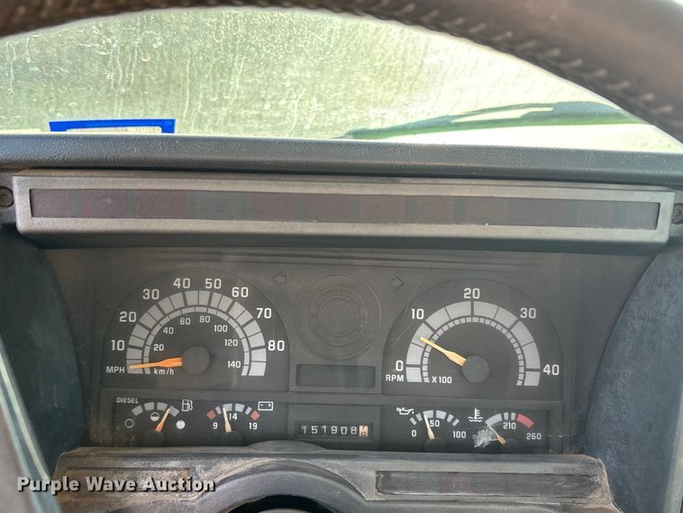 image for item FC2156 1999 GMC C7 flatbed truck